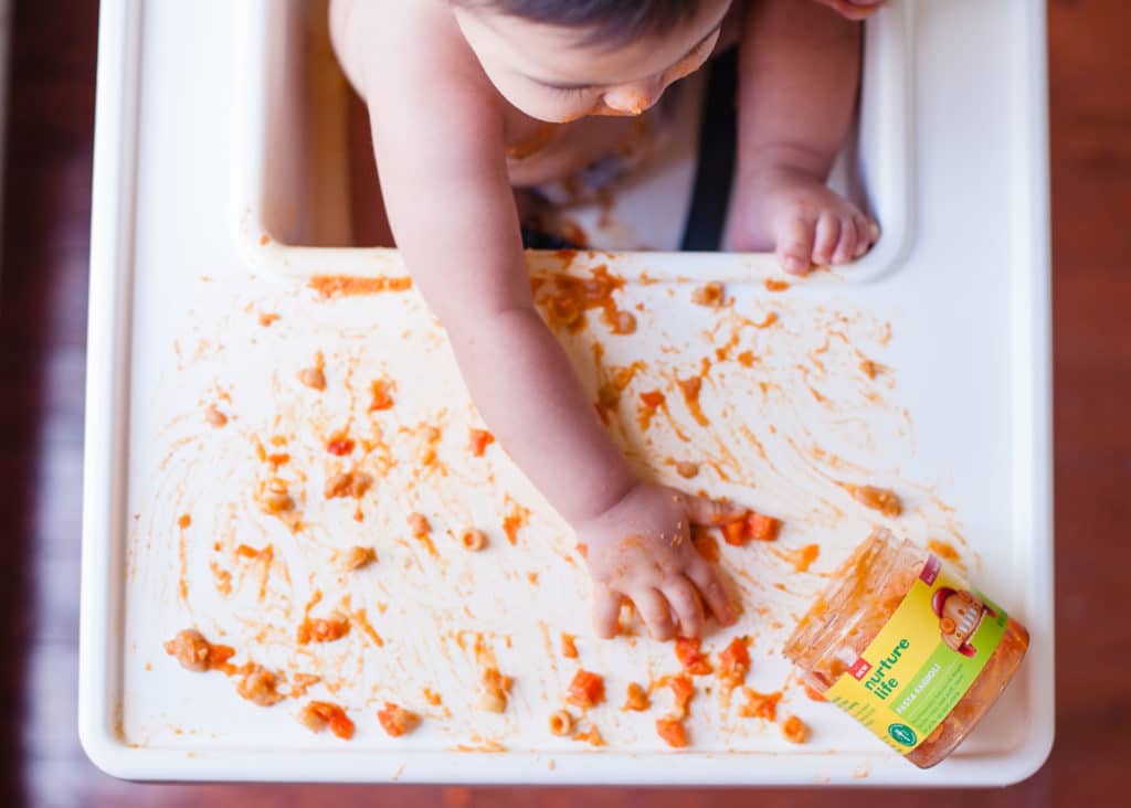 toddler trying finger foods 